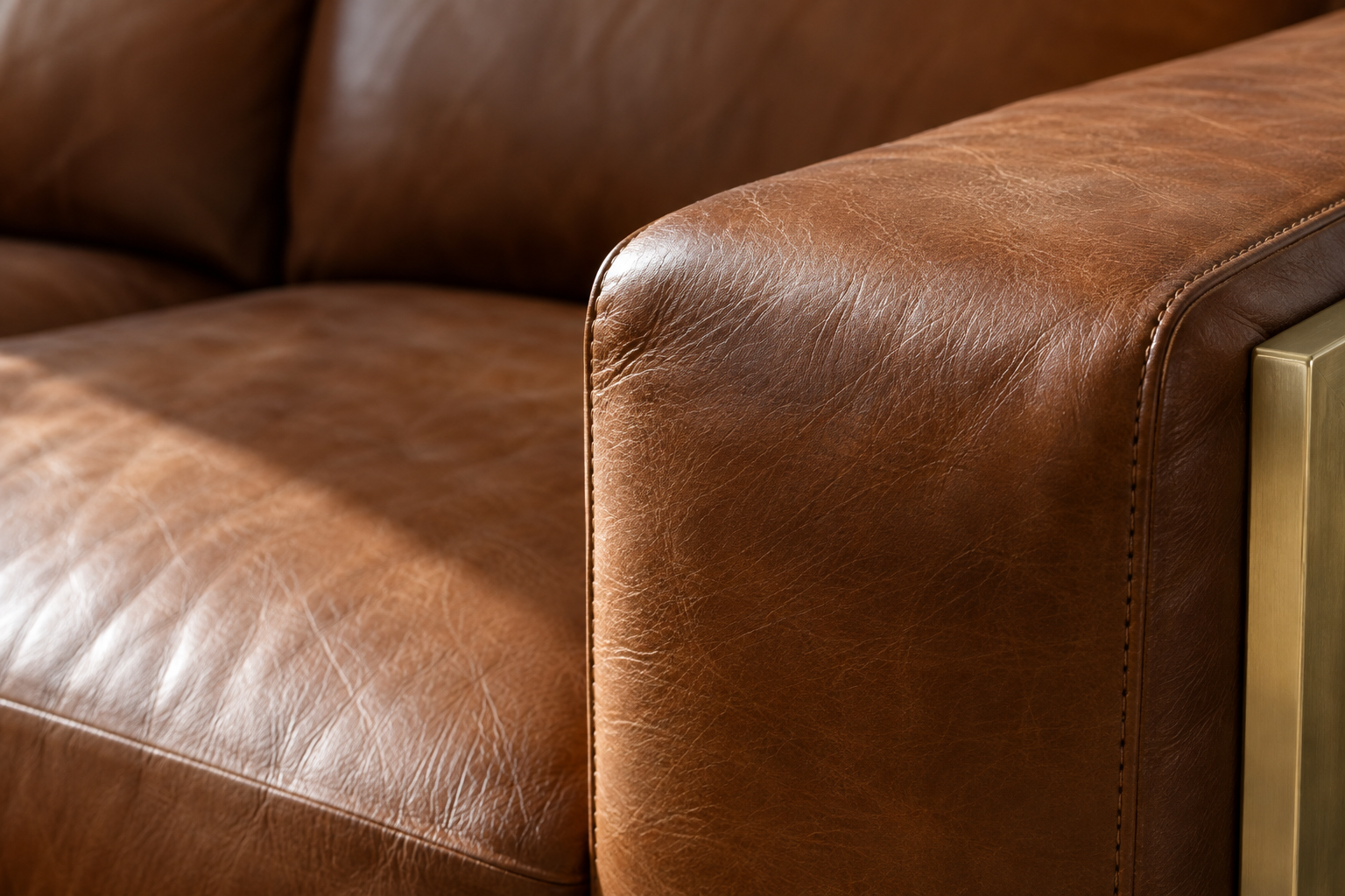 Close-up of cognac leather texture and natural grain.