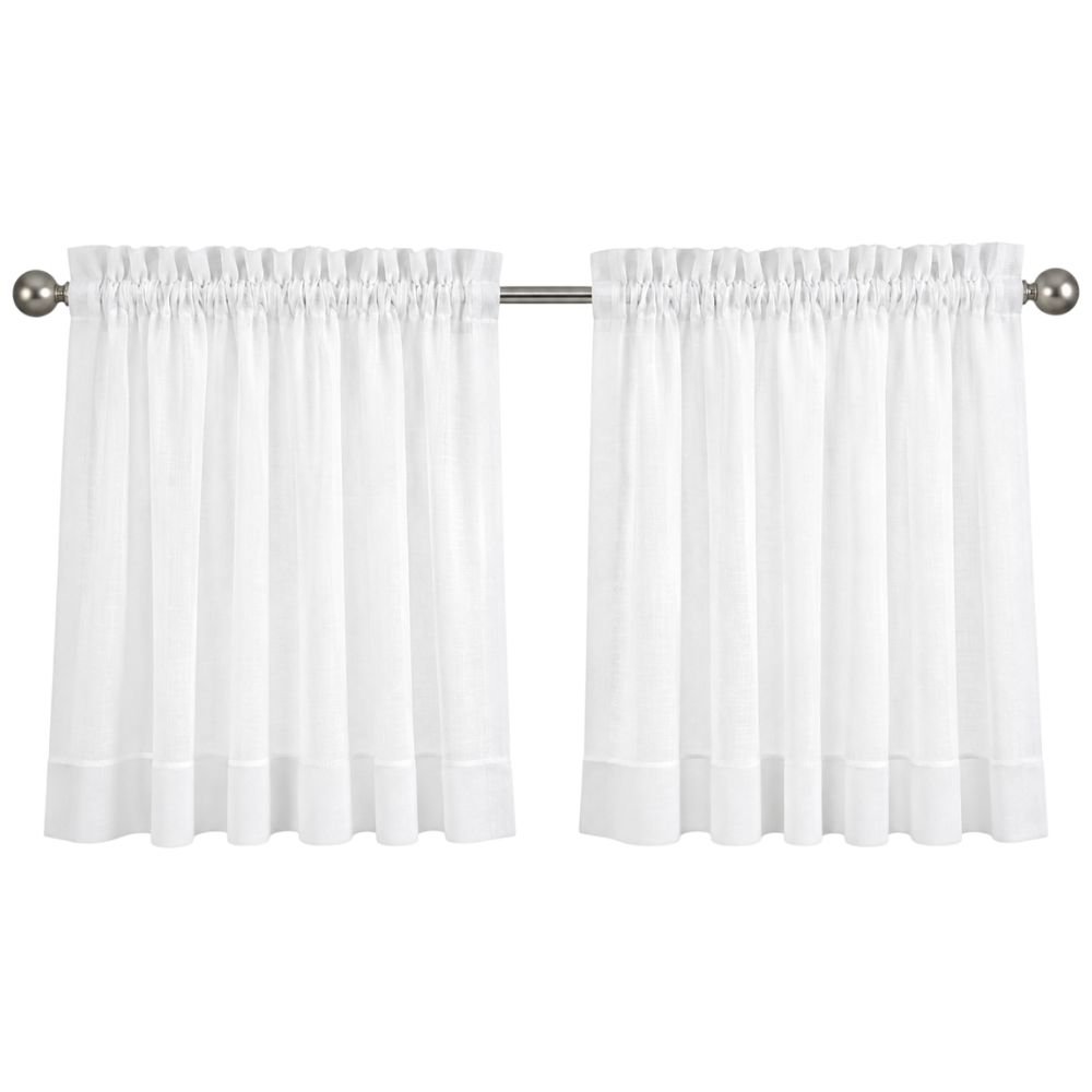 Custom rod pocket cafe curtain covering the lower half of a window