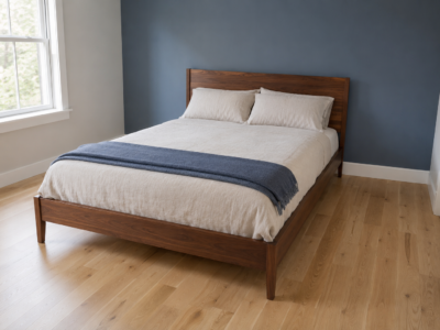 A queen bed sized correctly to a small bedroom, with real walking space on both sides