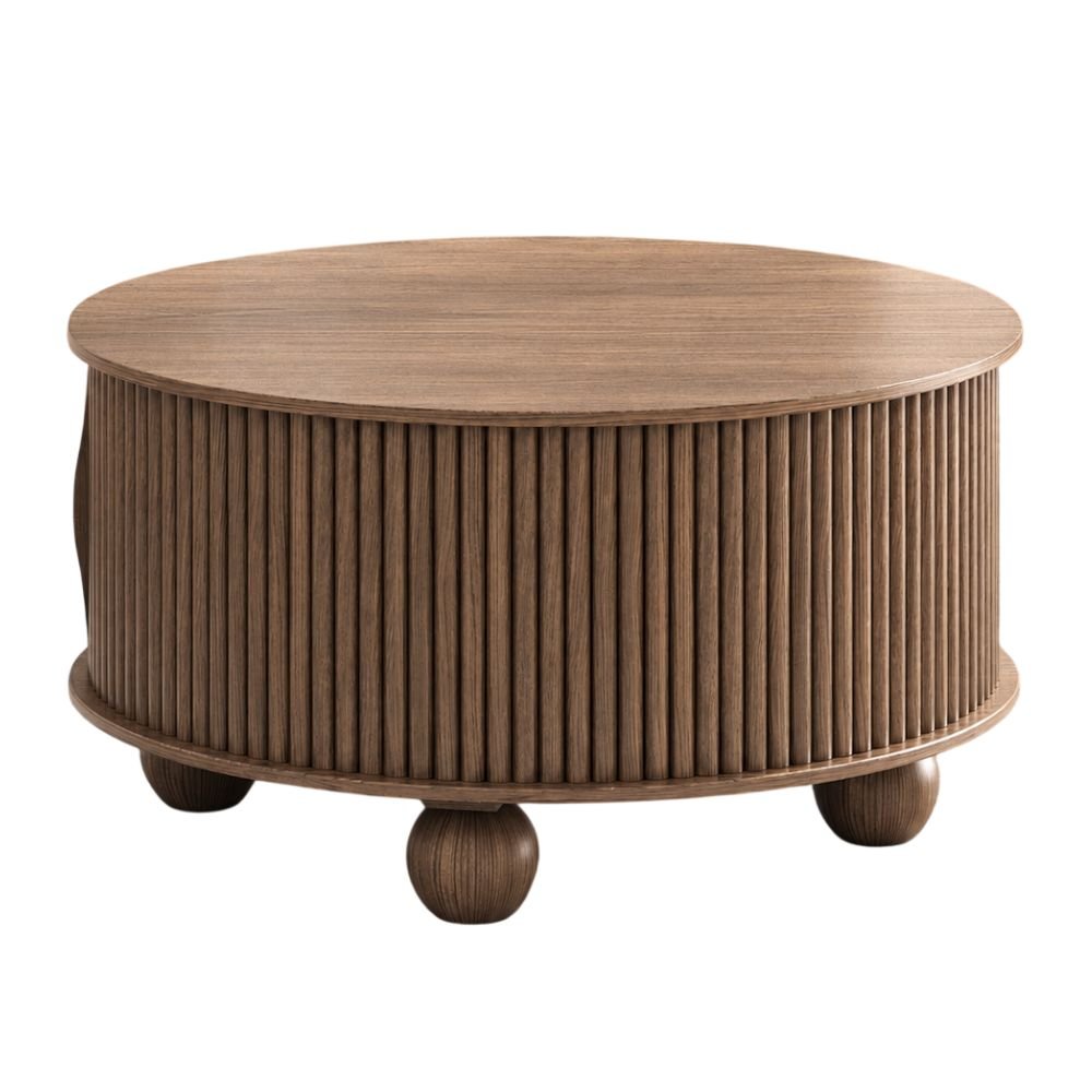 Round walnut coffee table with a fluted sliding storage door and bun feet