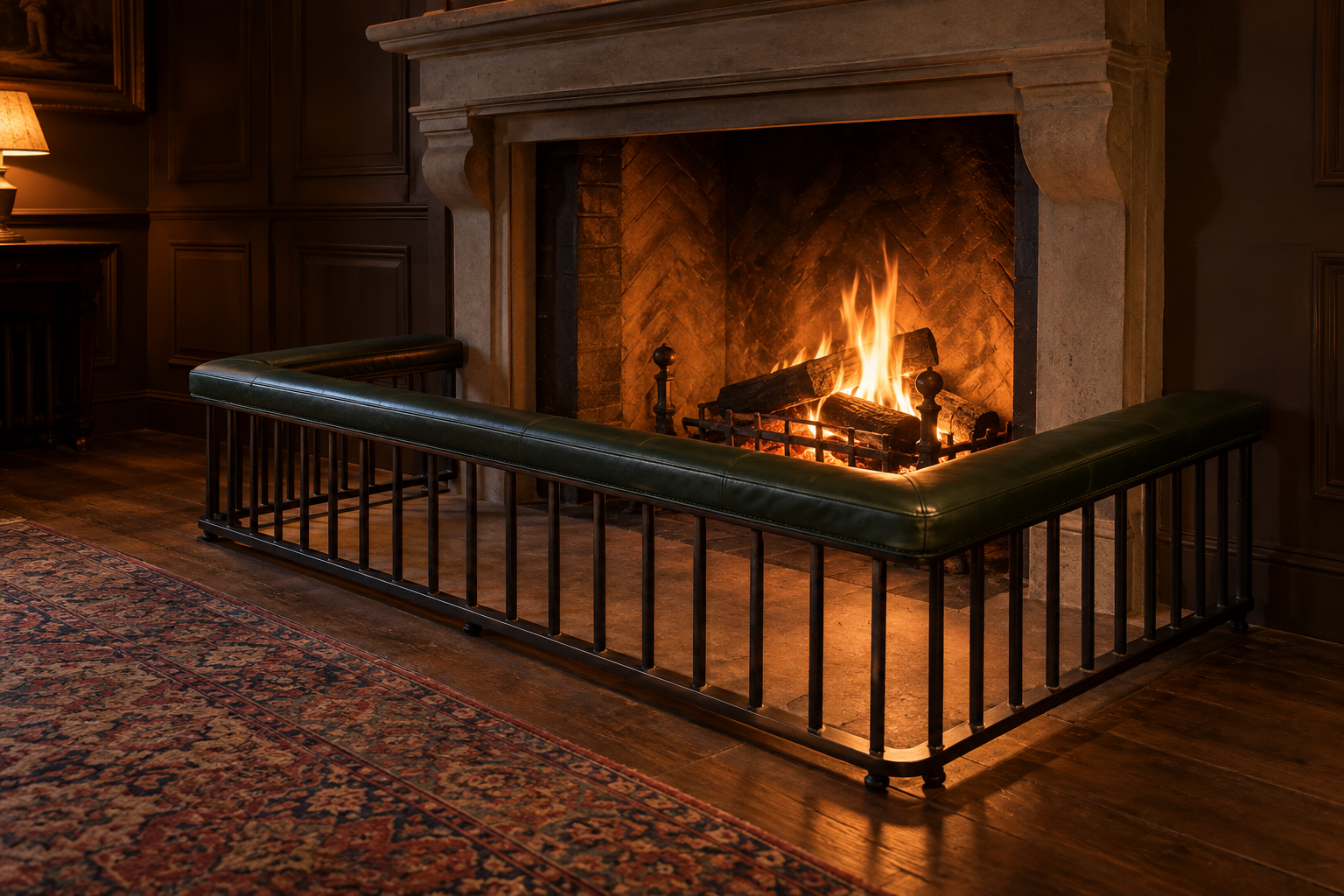 A club fender with a bottle green leather seat around the hearth of a stone fireplace in a brown paneled room.